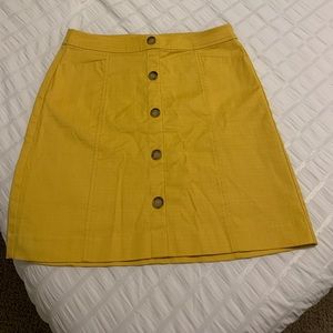 Fashion Button down skirt that comes slightly above the knee. Zip-up back ☺️